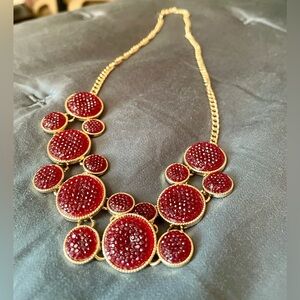 Deep red rhinestone statement bib necklace with gold chain